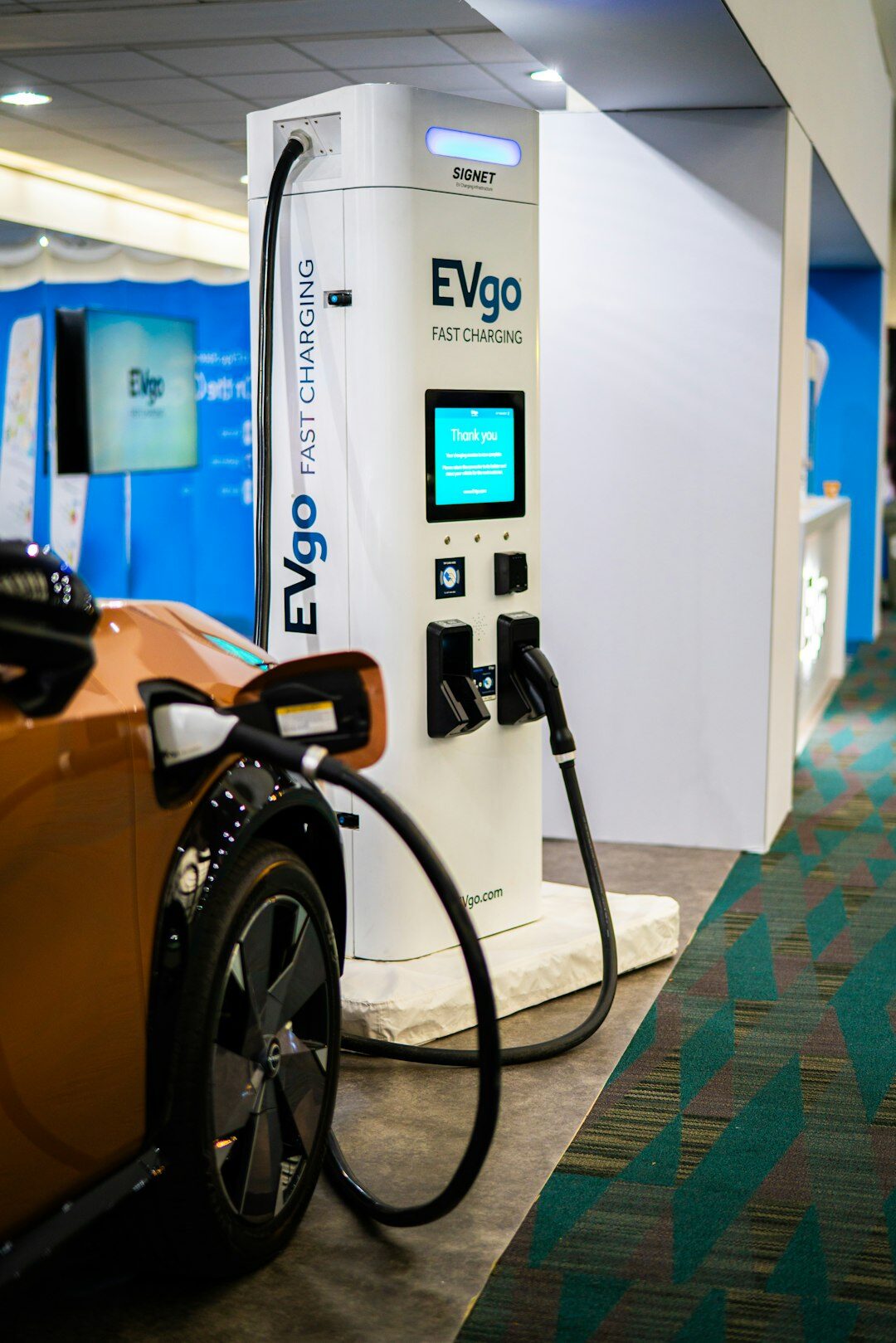 Electric vehicle connected to a charging station